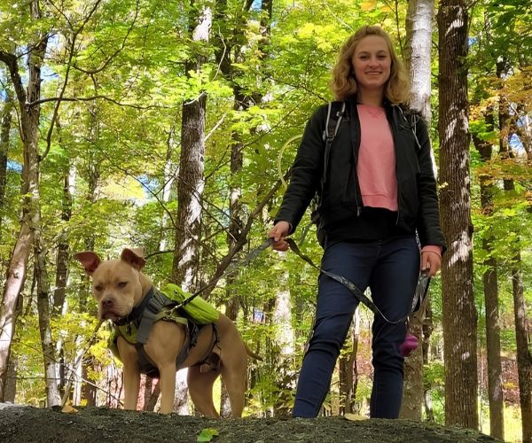 Dr. Amanda Armstrong with a dog in a stroller